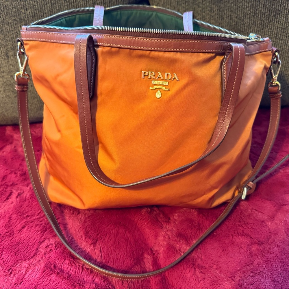 Prada excellent used condition!Handles and crossbody bag. Zipper top. Very clean